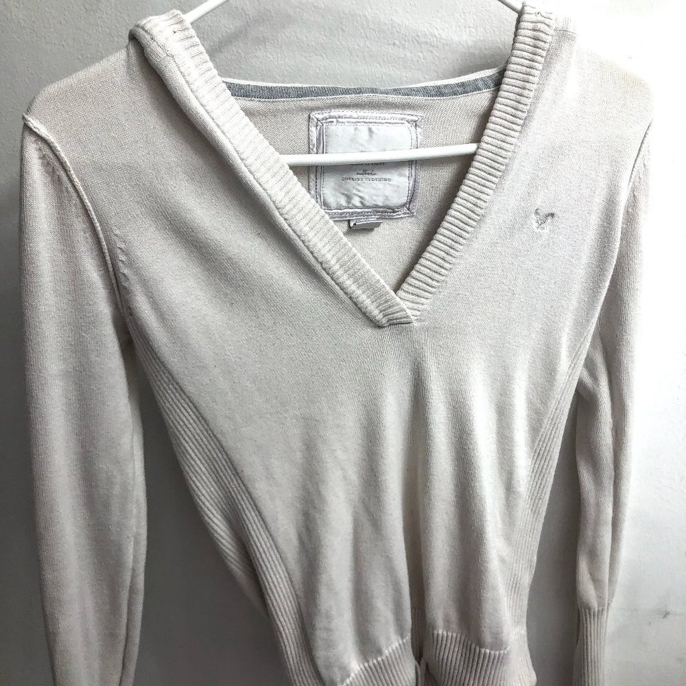 Long sleeve white/pinkish shirt/sweater